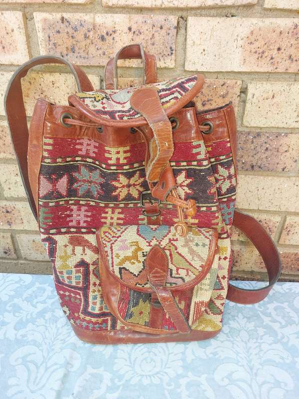 A BEATIFULL LEATHER WITH EMBROIDED ART WORK NAPSAK MADE BY KILIM ART IN TURKEY