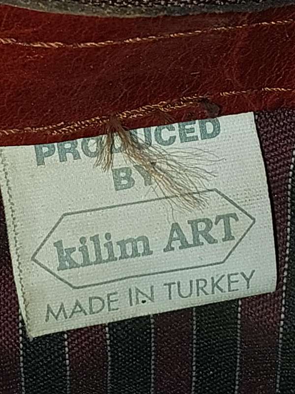 A BEATIFULL LEATHER WITH EMBROIDED ART WORK NAPSAK MADE BY KILIM ART IN TURKEY