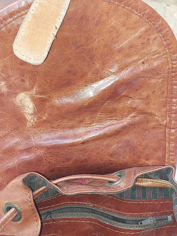 A BEATIFULL LEATHER WITH EMBROIDED ART WORK NAPSAK MADE BY KILIM ART IN TURKEY