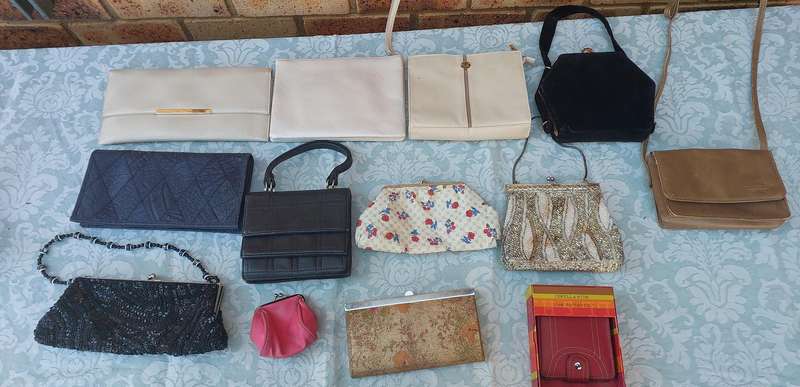 A COLLECTION OF CLUTCH BAGS SOLD AS IS