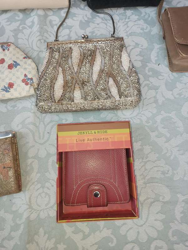 A COLLECTION OF CLUTCH BAGS SOLD AS IS