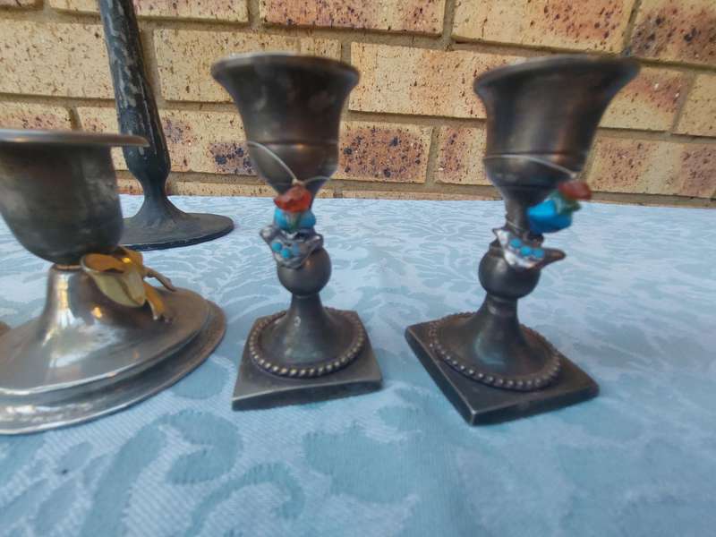 A VINTAGE JOBLOT SILVER PLATED CANDLE STANDS AND HOLDERS SOLD AS IS