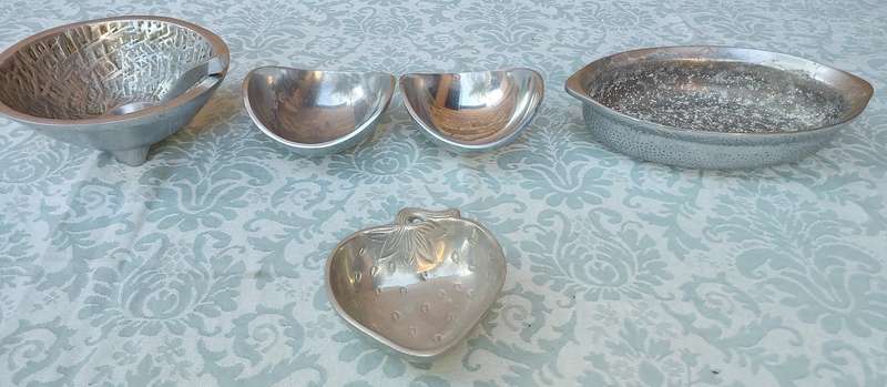 A COLLECTION OF PEWTEL UTENSILS SOLD AS IS