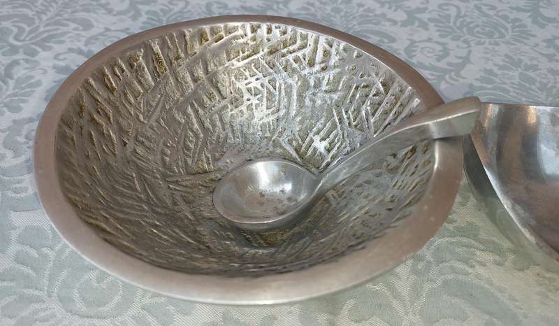 A COLLECTION OF PEWTEL UTENSILS SOLD AS IS