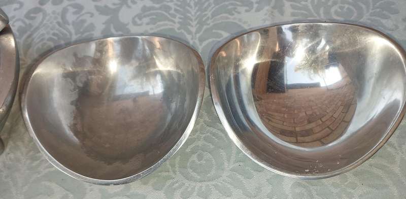 A COLLECTION OF PEWTEL UTENSILS SOLD AS IS