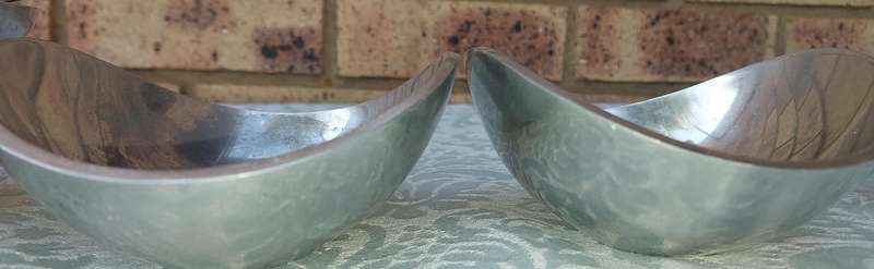 A COLLECTION OF PEWTEL UTENSILS SOLD AS IS