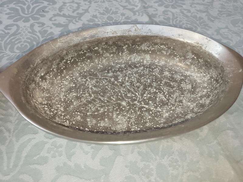 A COLLECTION OF PEWTEL UTENSILS SOLD AS IS