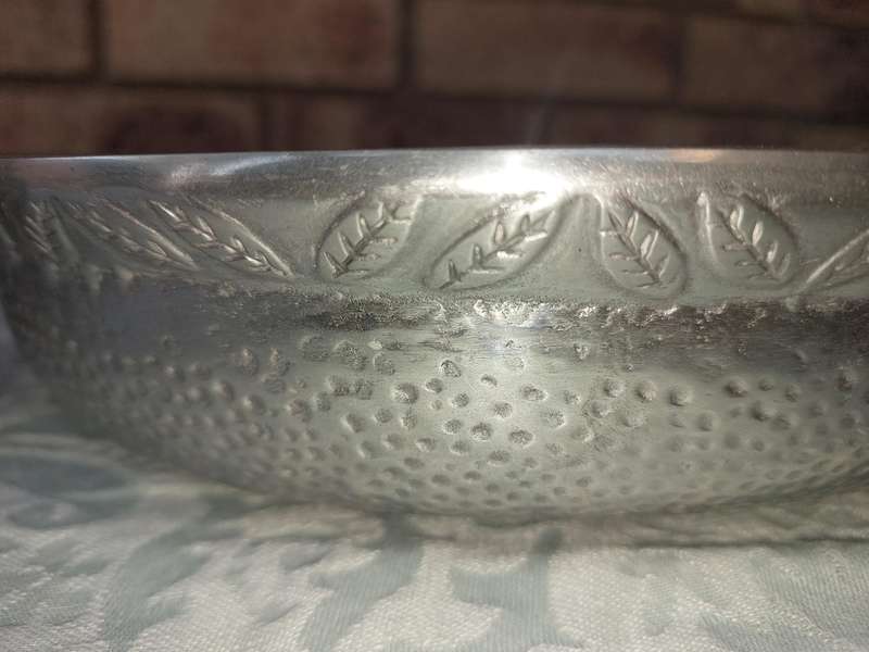 A COLLECTION OF PEWTEL UTENSILS SOLD AS IS