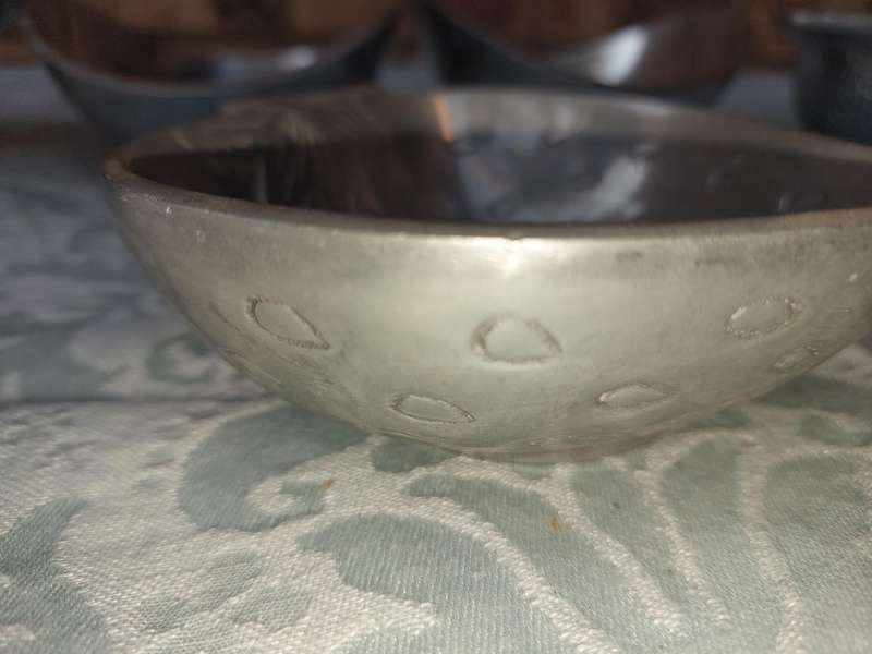 A COLLECTION OF PEWTEL UTENSILS SOLD AS IS
