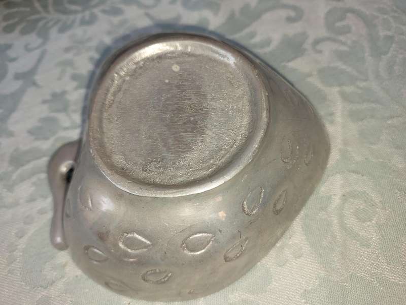 A COLLECTION OF PEWTEL UTENSILS SOLD AS IS