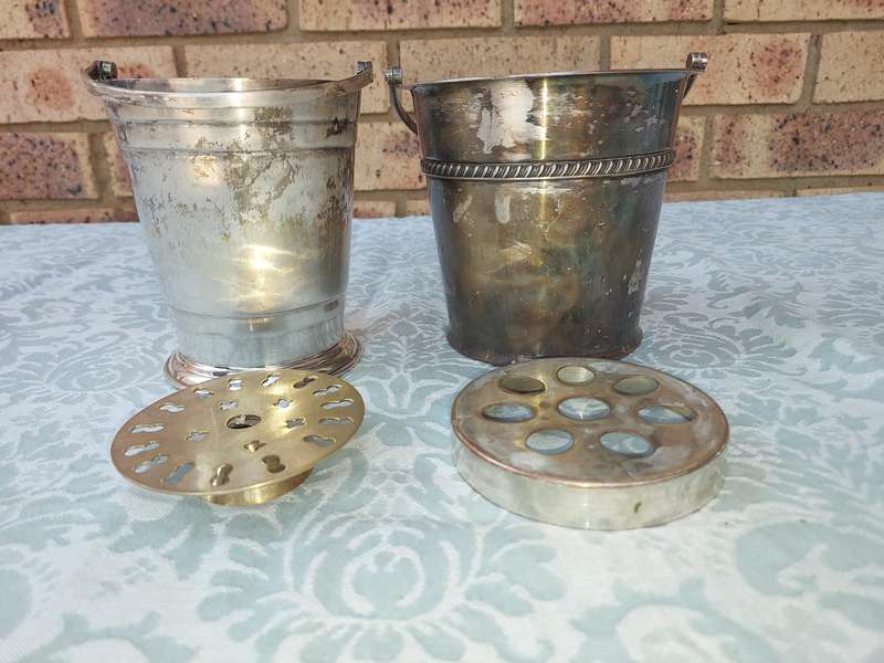 A COLLECTION OF VINTAGE SILVER PLATED ICE BUCKETS SOLD AS IS