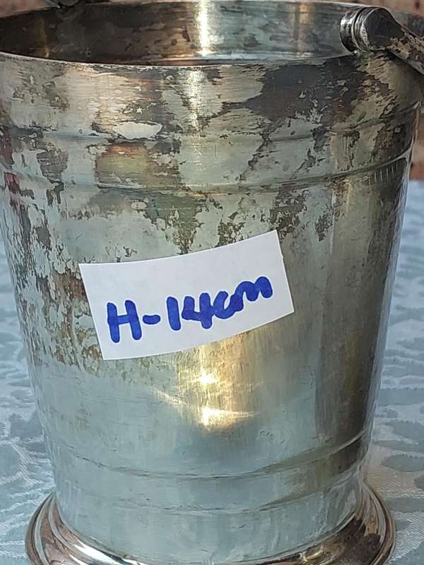 A COLLECTION OF VINTAGE SILVER PLATED ICE BUCKETS SOLD AS IS