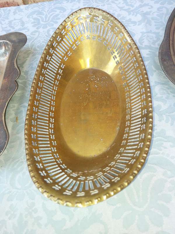 AN ENTIRE COLLECTION OF EPNS WEDDING SERVING BASKETS AND KITCHEN UNTENSILS SOLD AS IS