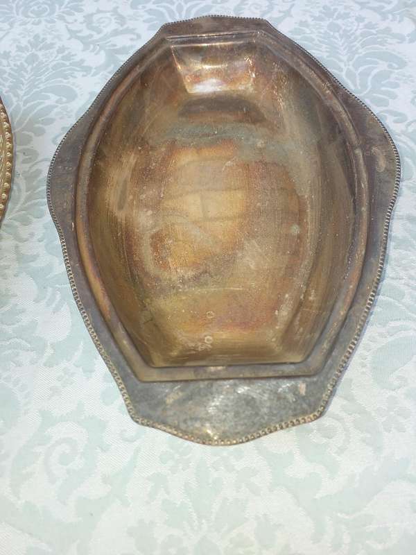 AN ENTIRE COLLECTION OF EPNS WEDDING SERVING BASKETS AND KITCHEN UNTENSILS SOLD AS IS