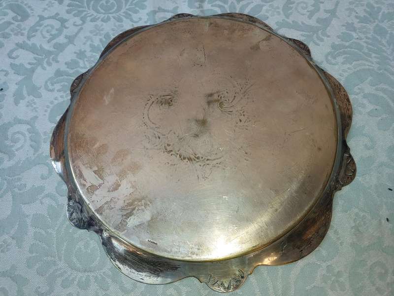 AN ORNATE VICTORIAN SIVER PLATED SERVING TRAY SOLD AS IS