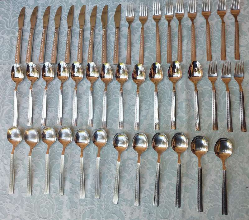 A SET OF 46. 18/ 8 STAINLESS STEEL CUTLERY SOLD AS IS