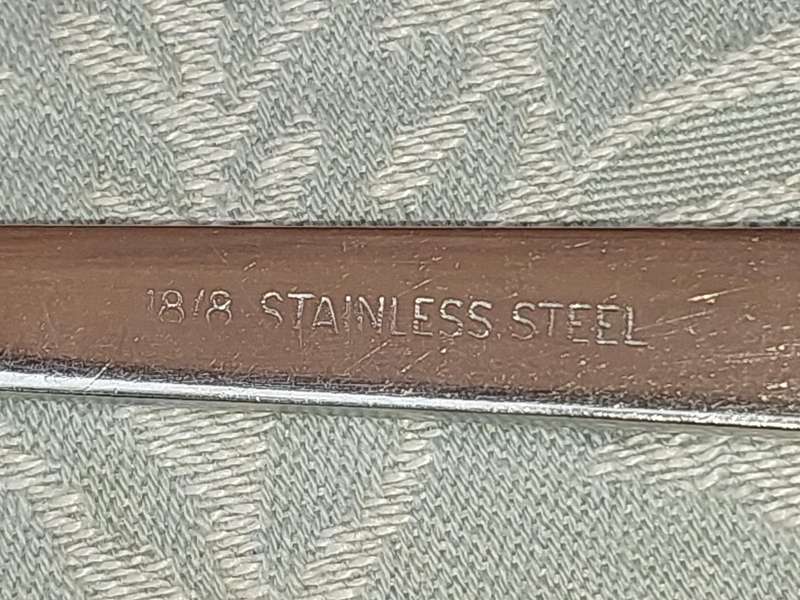 A SET OF 22 , 18/8 CUTLERY SOLD AS IS