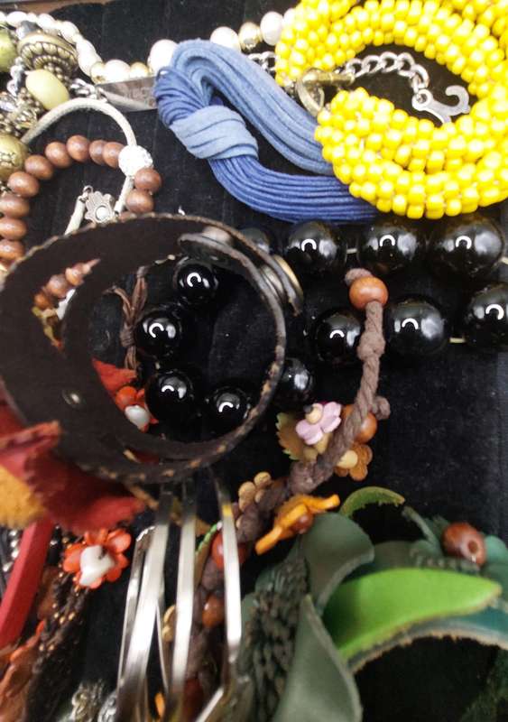 A collection of costume bangles and bracelets sold as is