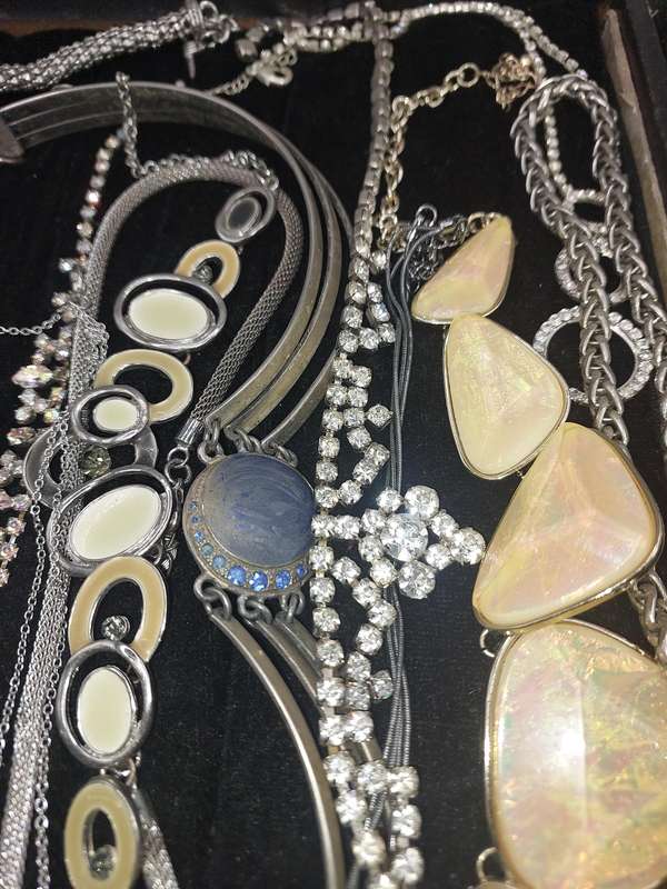 A QUALITY COLLECTION OF SILVER PLATED AND STAINLESS STEEL NECKLACES SOME WITH CRYSTALS SOLD AS IS