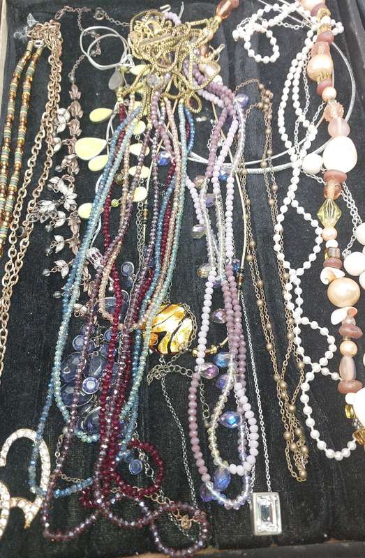 A COLLECTION OF QUALITY COSTUME NECKLACES SOLD AS IS