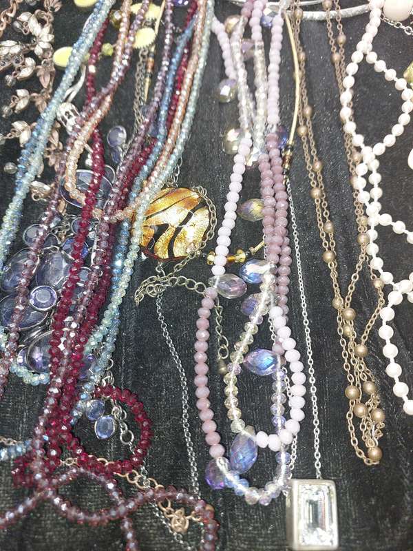 A COLLECTION OF QUALITY COSTUME NECKLACES SOLD AS IS