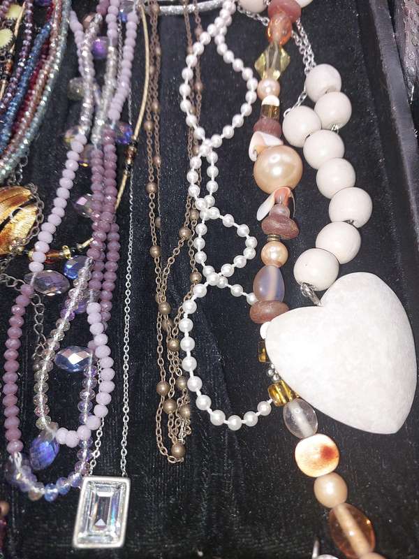 A COLLECTION OF QUALITY COSTUME NECKLACES SOLD AS IS