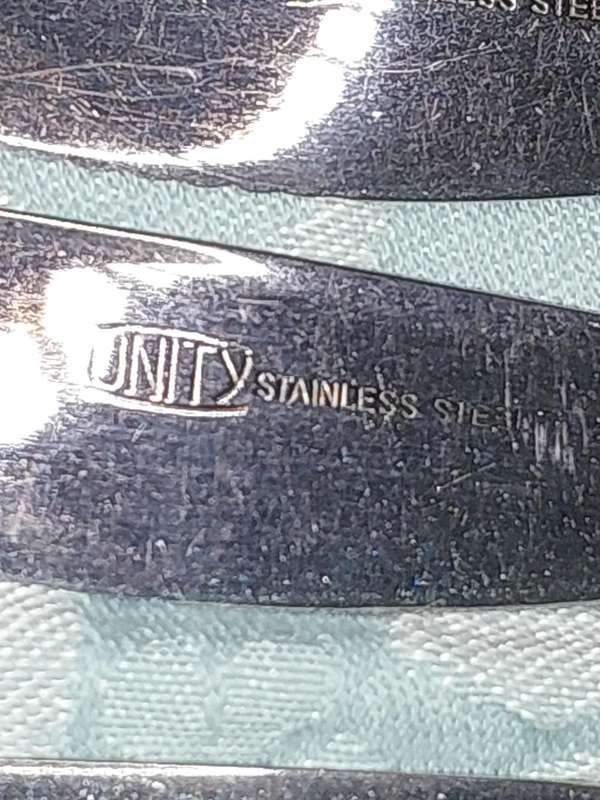 A UNITY STAINLESS STEEL 82 PIECE CUTLERY SET IN GREAT CONDITION SOLD AS IS