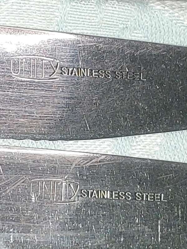 A UNITY STAINLESS STEEL 82 PIECE CUTLERY SET IN GREAT CONDITION SOLD AS IS