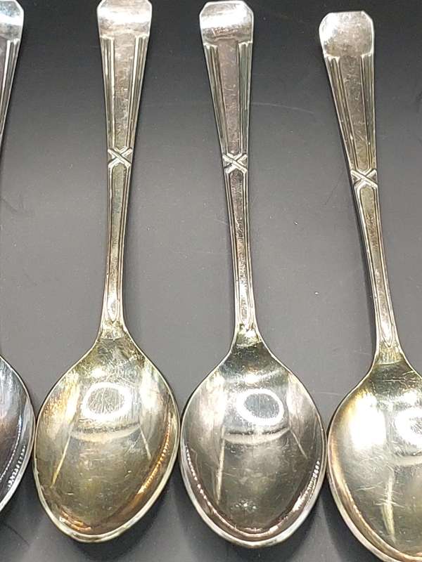 A VINTAGE SET OF 5 EPNS TEASPOONS SOLD AS IS