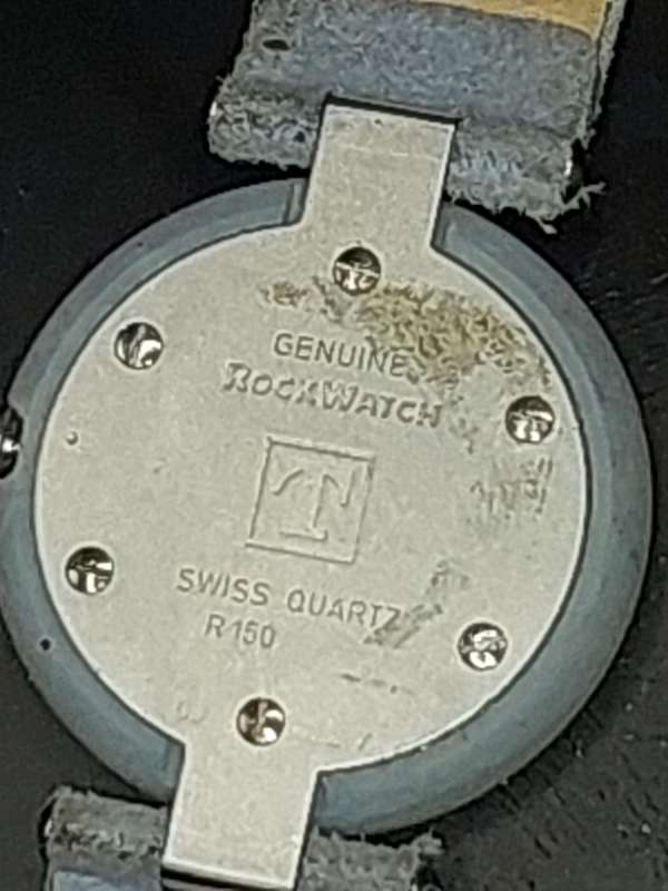 A RARE TISSOT GREY STONE WATCH