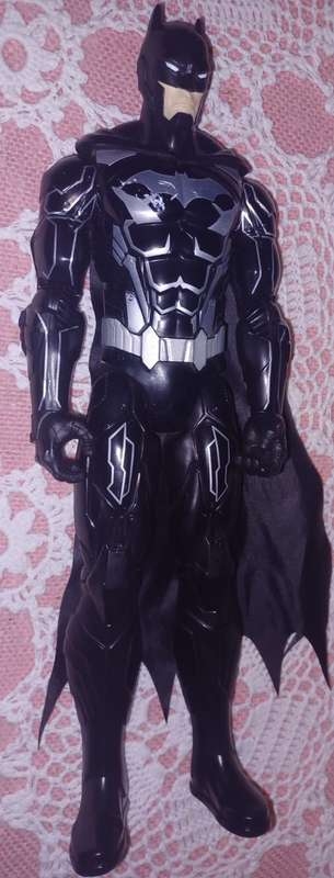 Batman figure with silver belt and markings