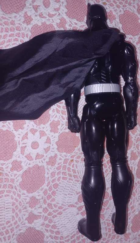 Batman figure with silver belt and markings