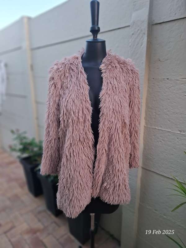 Dusty pink fur coat by Cape town designer Cindy Bam. Size M