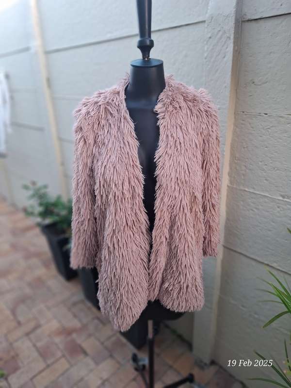 Dusty pink fur coat by Cape town designer Cindy Bam. Size M