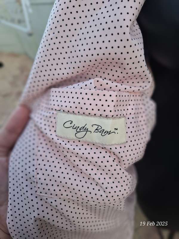 Dusty pink fur coat by Cape town designer Cindy Bam. Size M