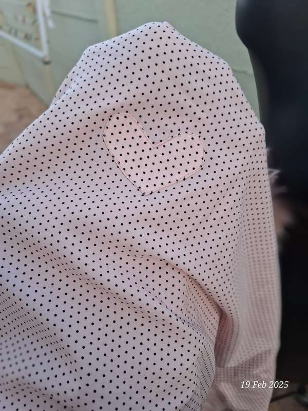 Dusty pink fur coat by Cape town designer Cindy Bam. Size M