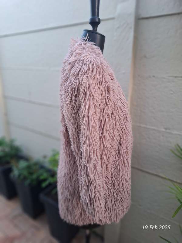 Dusty pink fur coat by Cape town designer Cindy Bam. Size M