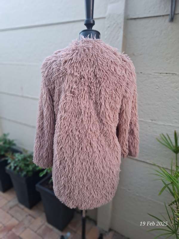 Dusty pink fur coat by Cape town designer Cindy Bam. Size M