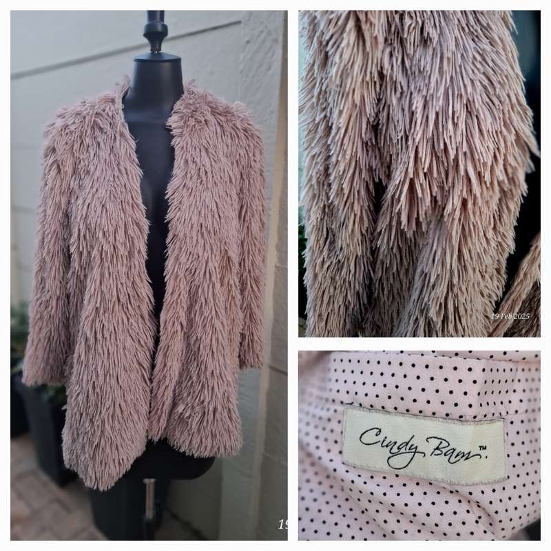 Dusty pink fur coat by Cape town designer Cindy Bam. Size M
