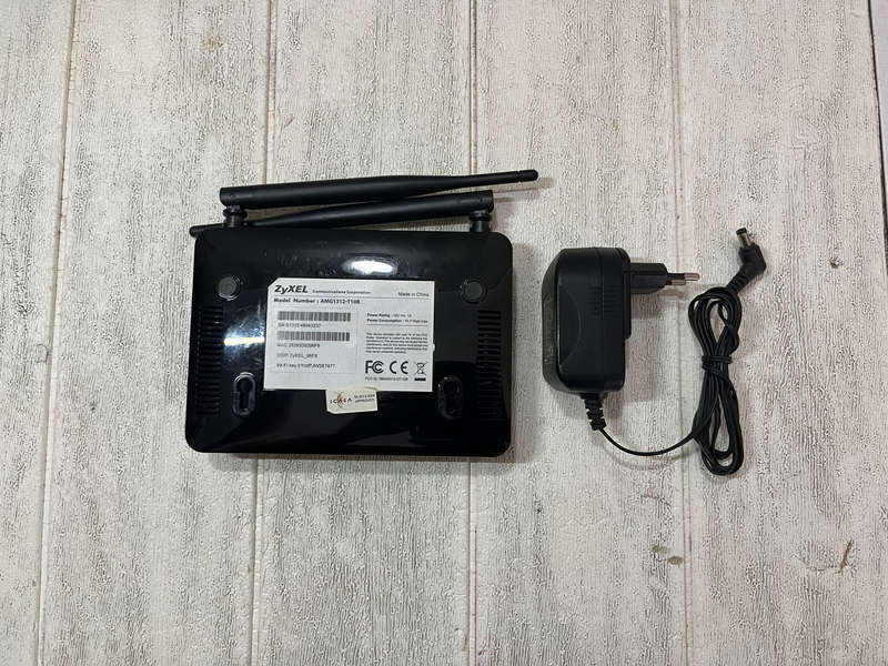 Zyxel AMG1312-T10B  High-Performance ADSL2+ Modem/Router
