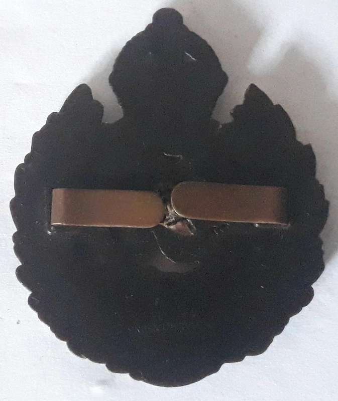 World War Two British Royal Engineers Plastic Economy Cap Badge