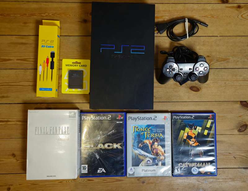 PlayStation 2 Console Bundle  Includes 4 Games, Memory Card & AV Cable