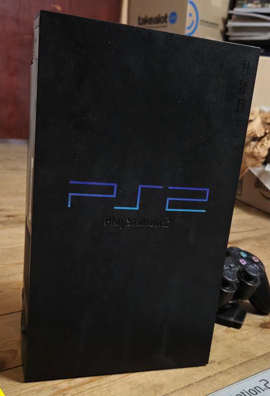 PlayStation 2 Console Bundle  Includes 4 Games, Memory Card & AV Cable