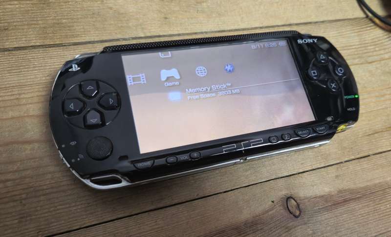 PSP Fat Bundle with 5 Games, Original Charger, Memory Stick