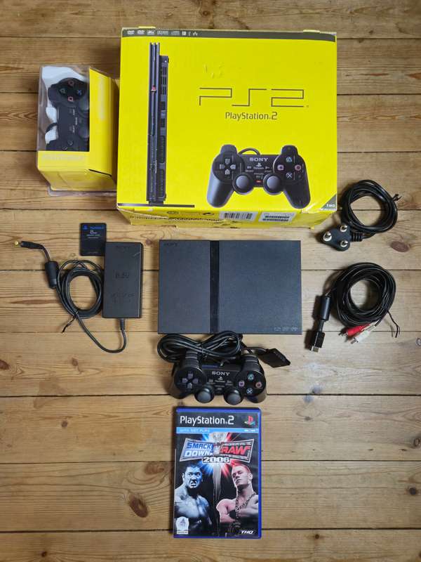 PS2 Slim Yellow Box | Excellent Condition | PS1 Compatible | WWE + 2 Controllers