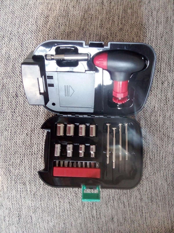 Flashlight with toolbox