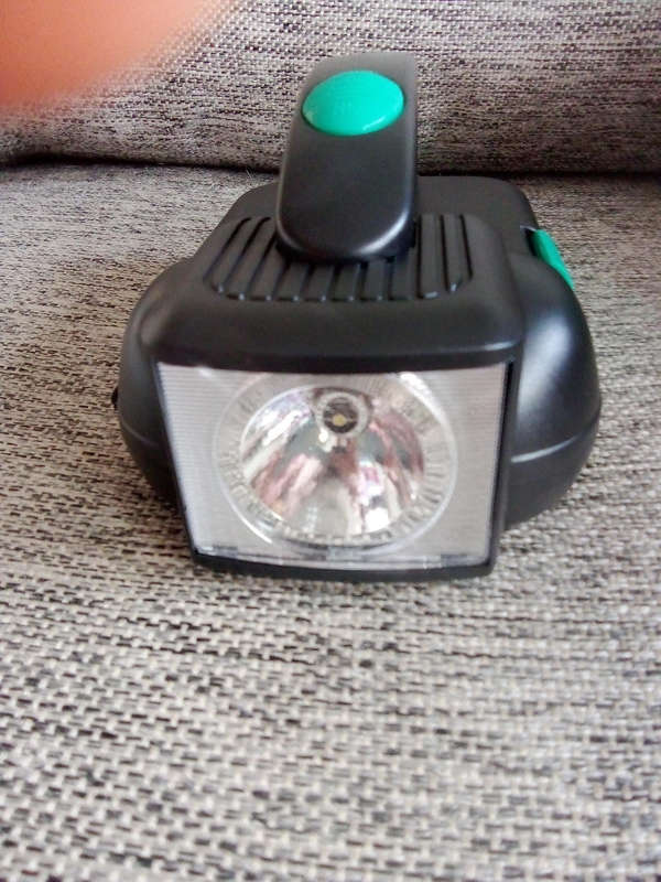 Flashlight with toolbox