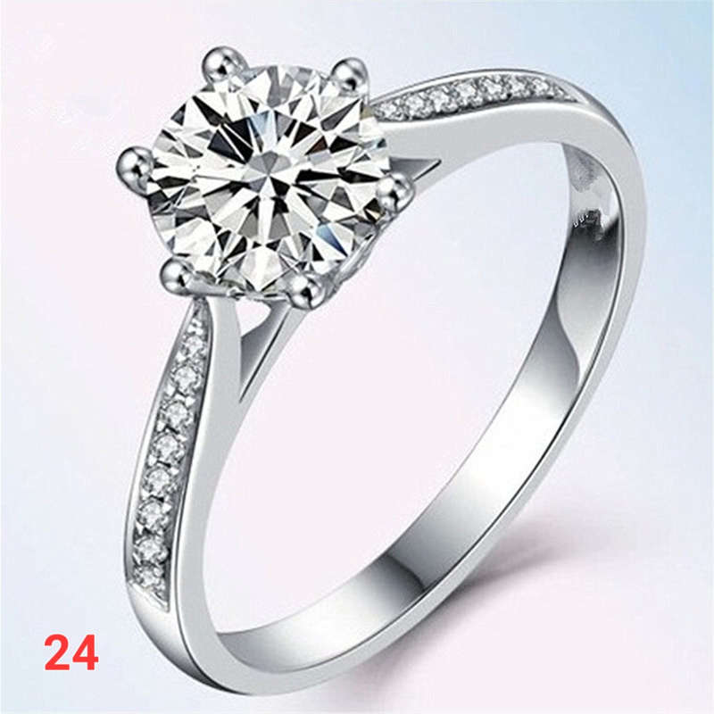 4 assorted zircon rings
