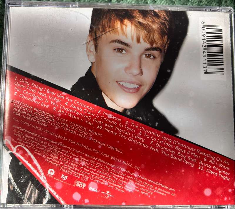 Justin Bieber CDs x 2, Under the Mistletoe & My Worlds