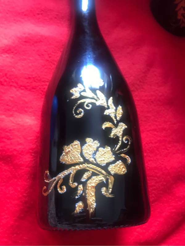 Beautiful green with gold painting on Two Bottles